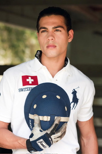 Ray Diaz in a Polo campaign holding a polo helmet